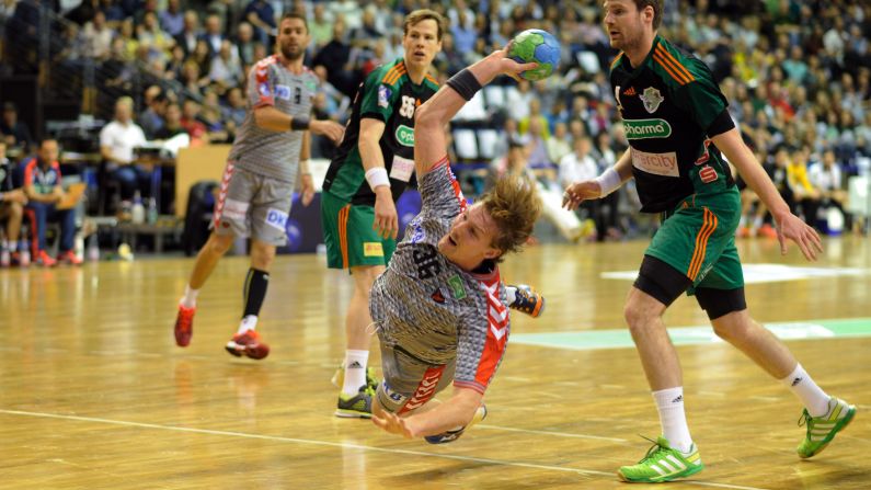 Jesper Nielsen of Fuchse Berlin makes a throw during a handball match against TSV Hannover-Burgdorf on Sunday, October 18.