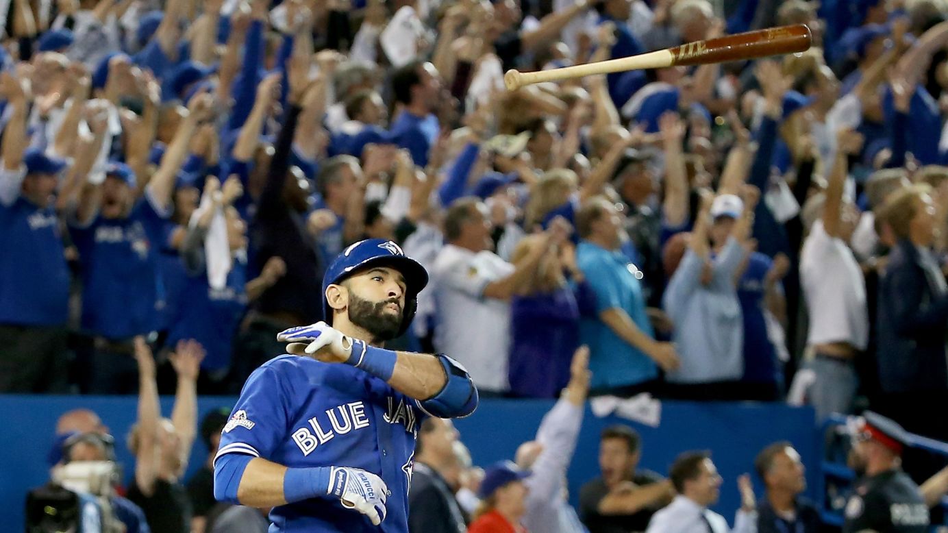 Toronto sports fans exulted when Jose Bautista of the Blue Jays threw his bat after hitting a home run to win game five of the American League Division Series last October. Toronto lost in the next round, however, to the Kansas City Royals, depriving the city of hosting its first World Series since 1993. "This city is just dying for a winner," says Raptors GM Ujiri.