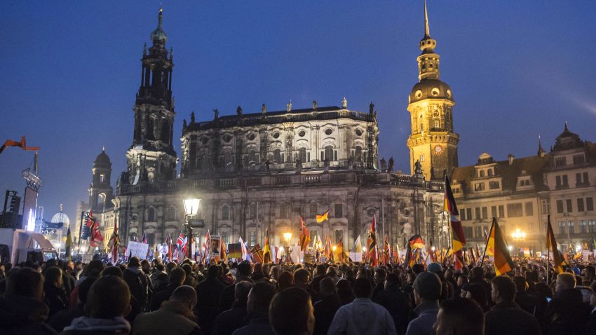 Protestors attend a demonstration of PEGIDA (Patriotic Europeans against the Islamization of the West), marking the first anniversary of the anti-Islam group in Dresden, Germany, Monday, Oct. 19, 2015.