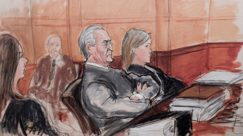 In this courtroom sketch, Vincent Asaro, 80, third from left, sits flanked by his defense attorneys during opening arguments, Monday, Oct. 19, 2015, at federal court in the Brooklyn borough of New York, in his federal racketeering conspiracy trial for his role in the $6 million, 1978 Lufthansa cargo heist at John F. Kennedy airport.  The dramatic robbery was immortalized in the film "Goodfellas."  Asaro is charged, along with his son, Jerome, and three other defendants, in a wide-ranging indictment alleging murder, robbery, extortion, arson and other crimes from the late 1960s through 2013. (Elizabeth Williams via AP)