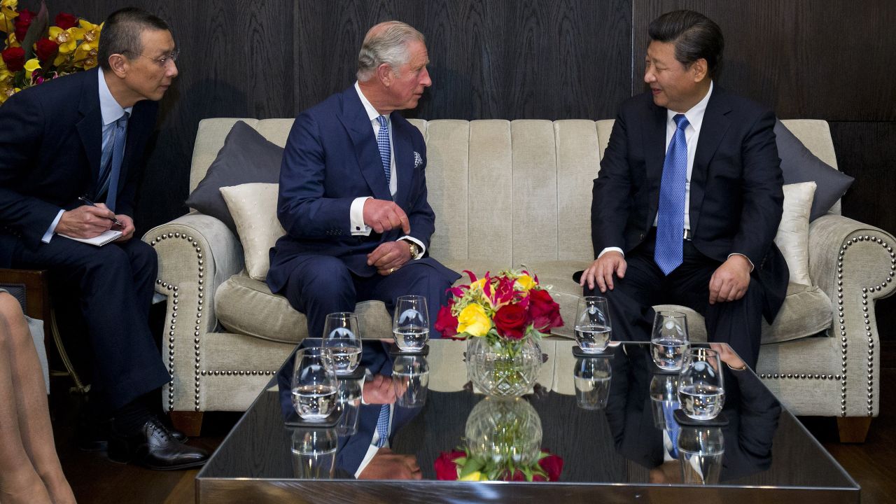 Prince Charles talks with Xi at a London hotel on October 20.