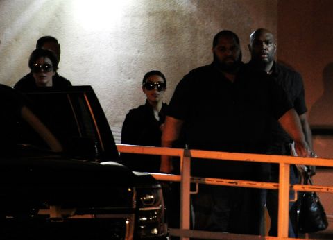 Kris Jenner, left, and Kim Kardashian leave Sunrise Hospital & Medical Center in Las Vegas where Odom was being treated on Wednesday, October 14.