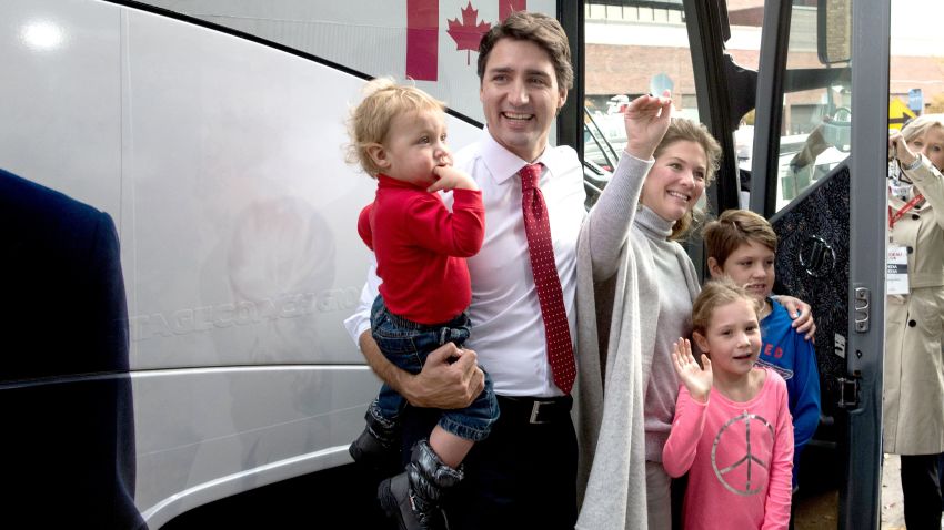 Canadian Liberal Party leader Justin Trudeau leaves after casting his ballot with his wife Sophie and their children Hadrien(L), Ella-Grace(2nd-R) and Xavier(R) in Montreal on October 19, 2015. The first of 65,000 polling stations opened Monday on Canada's Atlantic seaboard for legislative elections that pitted Prime Minister Stephen's Tories against liberal and social democratic parties. Up to 26.4 million electors are expected to vote in 338 electoral districts. Some 3.6 million already cast a ballot in advance voting a week ago, and the turnout Monday is expected to be high.   AFP PHOTO/NICHOLAS KAMM        (Photo credit should read NICHOLAS KAMM/AFP/Getty Images)