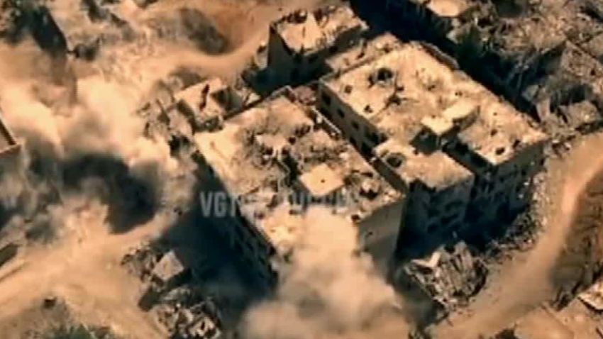 Highly-produced drone footage is broadcast to Russian homes showing smoke billowing from a Damascus suburb. 