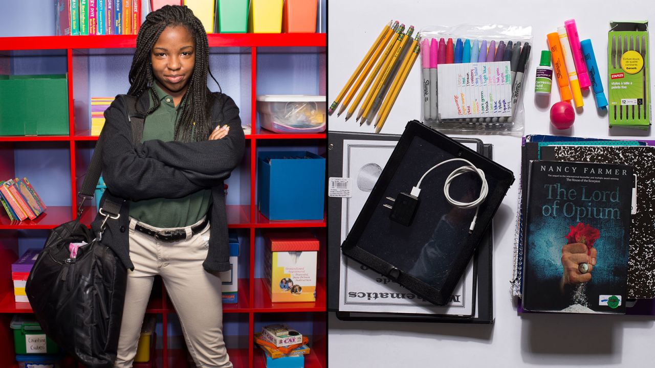 Amber, an eighth-grade student at KIPP STRIVE Academy, said she's not allowed to use her iPad at school, but she can't leave it behind because she uses it "for everything." Still, she has to carry her notebooks and books. 