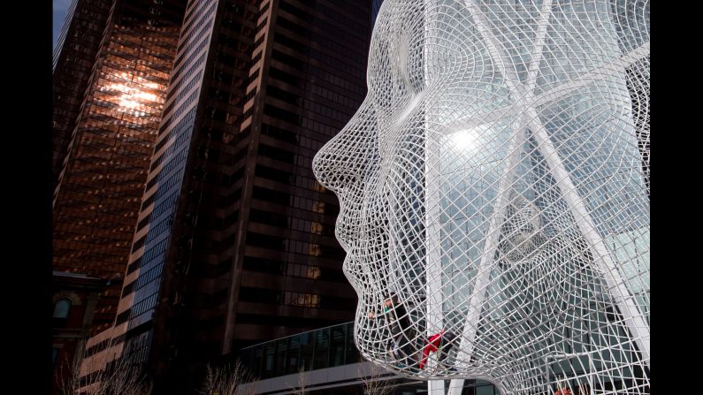The 12-meter "Wonderland" sculpture by Spanish artist Jaume Plensa has been a fixture in downtown Calgary since 2013. His other works include "Crown Fountain" in Chicago and "House of Knowledge" in Boras, Sweden. 