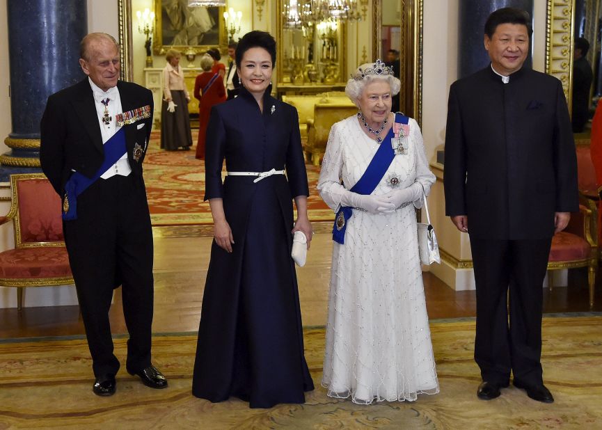 The Chinese leader and first lady join Queen Elizabeth II and Prince Philip at a state banquet on October 20.