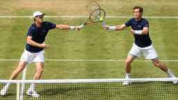 LONDON, ENGLAND - JULY 18:  Jamie Murray (L) and Andy Murray (R) of Great Britain in action in their match against Nicolas Mahut and Jo-Wilfried Tsonga of France during Day Two of the World Group Quarter Final Davis Cup match between Great Britain and France at Queens Club on July 18, 2015 in London, England. (Photo by Clive Brunskill/Getty Images).  (Photo by Clive Brunskill/Getty Images)