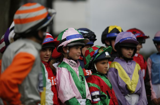 Held at the Plumpton Racecourse in Sussex, England, 16 young jockeys gallop down the home straight in front of thousands of fans.