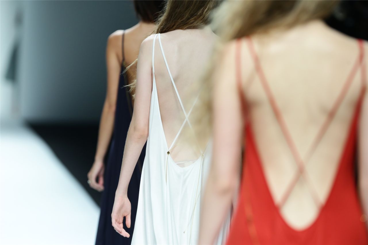 Barely-there spaghetti straps held together effortless, sensual dresses and jumpsuits.
