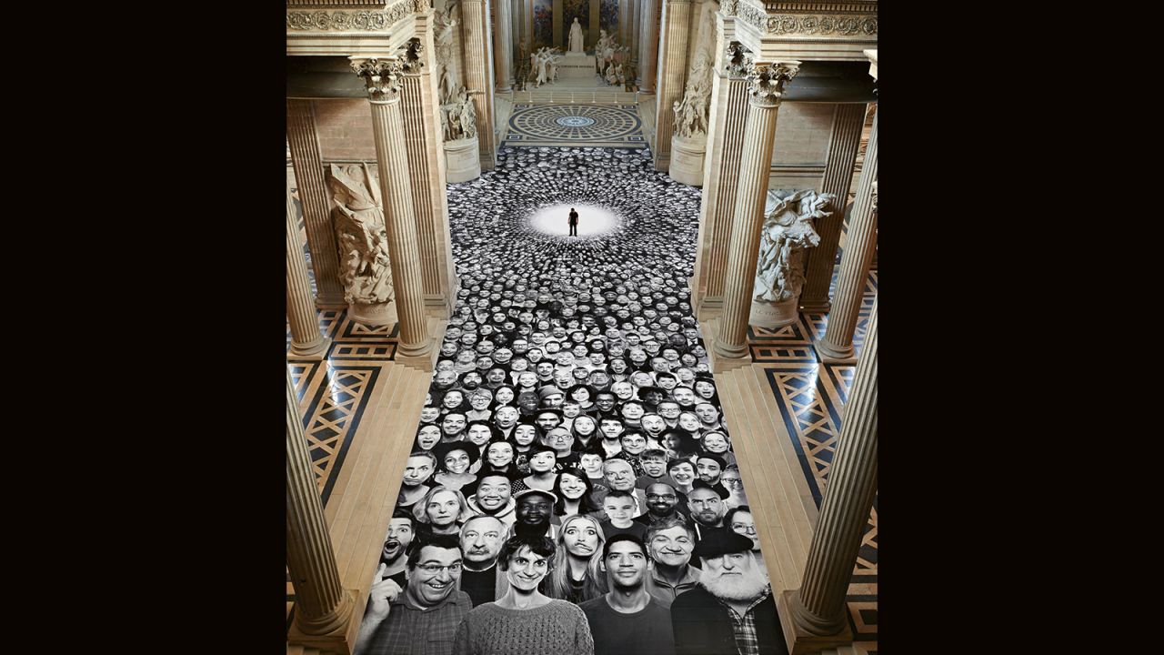 JR showcased 2,500 portraits from around the world to help celebrate the newly refurbished Pantheon in Paris in 2014. Faces lined the floor, walls and exteriors of the secular temple where many famous French people are buried.  