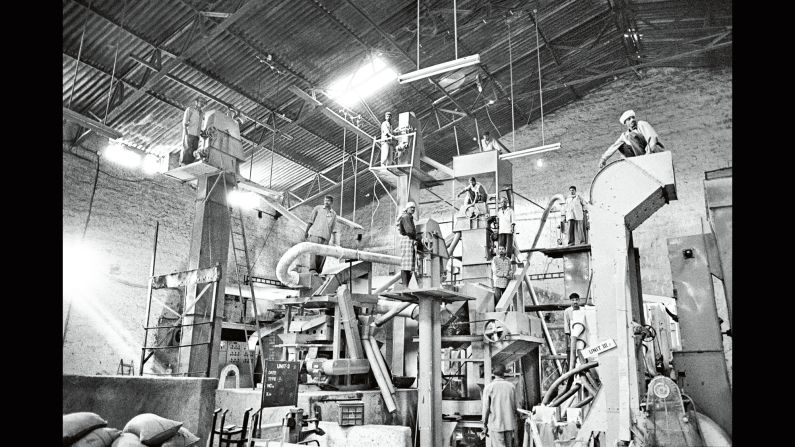 A machine processes coffee at a warehouse in India in 2003.
