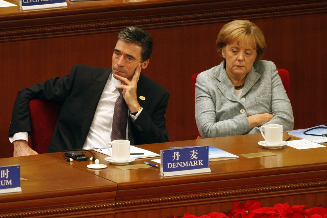 German Chancellor Angela Merkel attends the opening (with her eyes closed) of the 7th Asia-Europe Meeting in Beijing in October 2008.