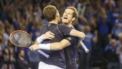 GLASGOW, UNITED KINGDOM - SEPTEMBER 19: Andy Murray celebrates with his brother Jamie as they beat Lleyton Hewitt and Sam Groth of Australia during day 2 of the Great Britain v Australia Davis Cup Semi Final 2015 at the Emirates Arena on September 19, 2015 in Glasgow, United Kingdom. (Photo by Steve Welsh/Getty Images)