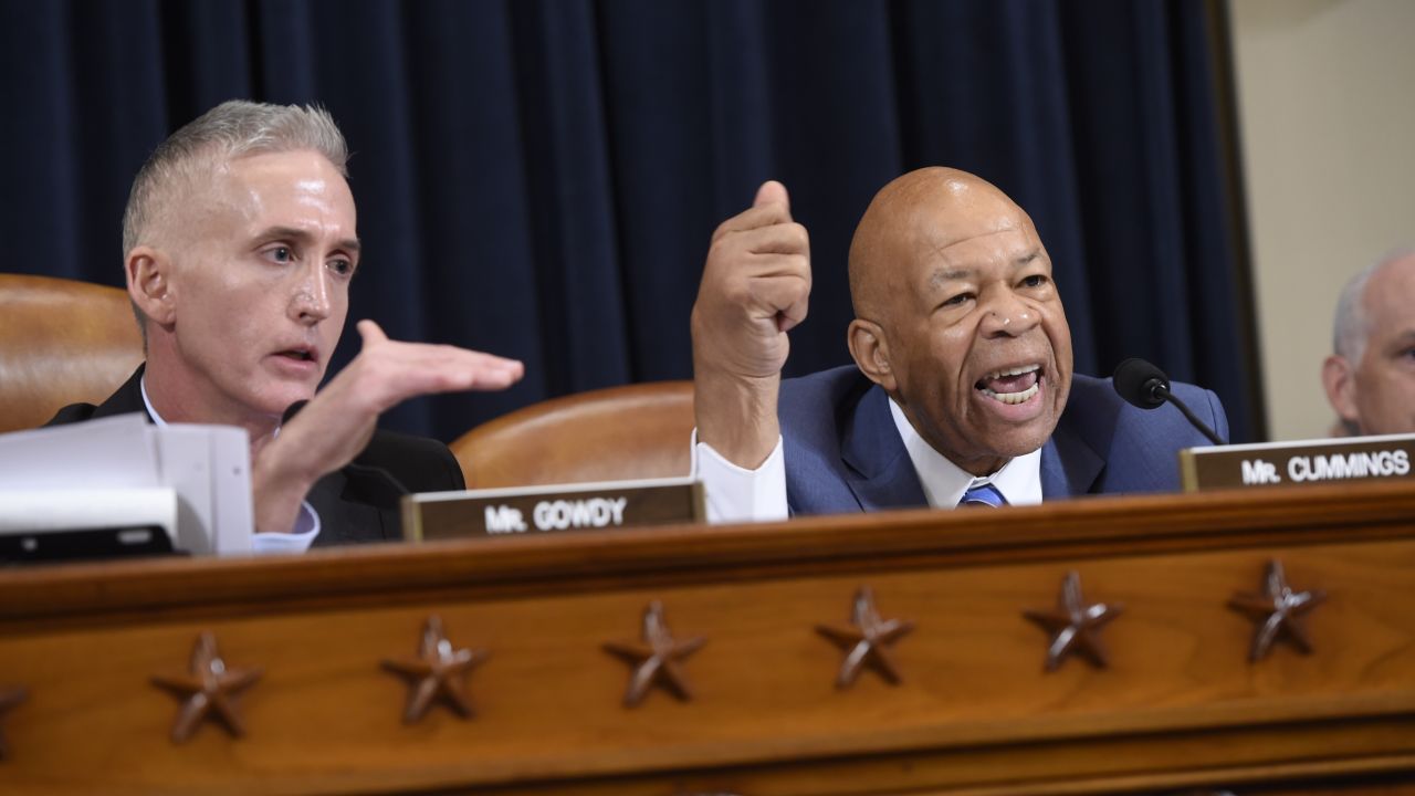 Republican US Representative from South Carolina Trey Gowdy (L) argues with Democratic US Representative Elijah Cummings during questioning of former US Secretary of State and Democratic Presidential hopeful Hillary Clinton as she testifies before the House Select Committee on Benghazi on Capitol Hill in Washington, DC, October 22, 2015. AFP PHOTO / SAUL LOEB        (Photo credit should read SAUL LOEB/AFP/Getty Images)