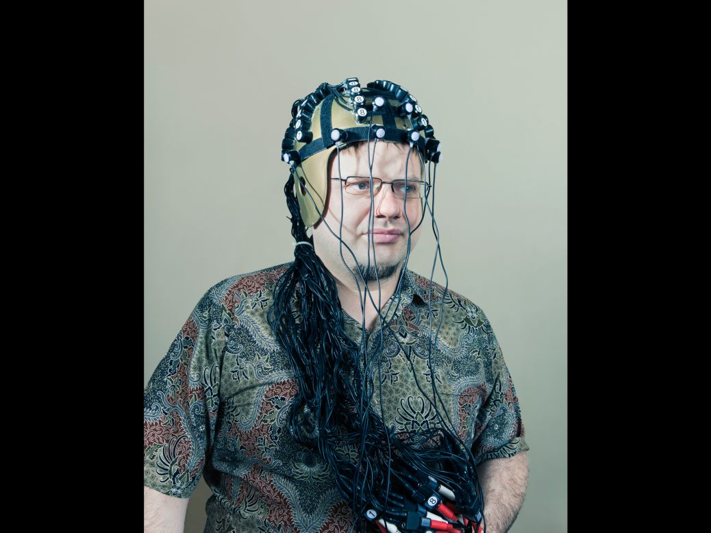 Shown here wearing a helmet outfitted with electrical coils,Vladimirov told CNN he has no problem being called a "brain hacker." He says he likes Hollywood's X-Men movie franchise, which is about evolving humans. He finds the X-Men films "quite useful in promoting our cause."