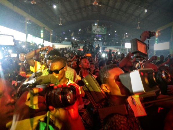The number of cameras present demonstrates the draw that Fela Kuti still has. 