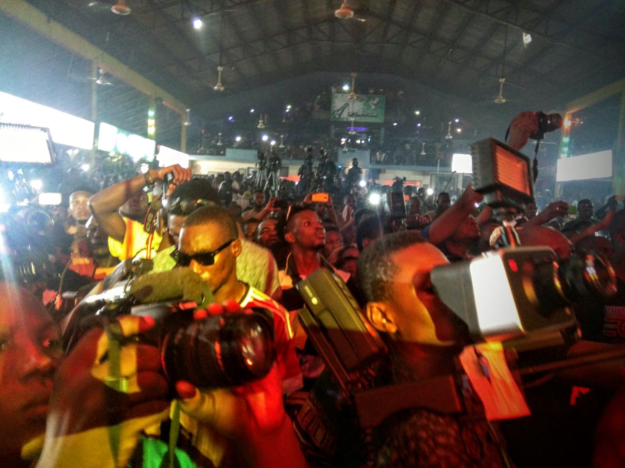 The number of cameras present demonstrates the draw that Fela Kuti still has.