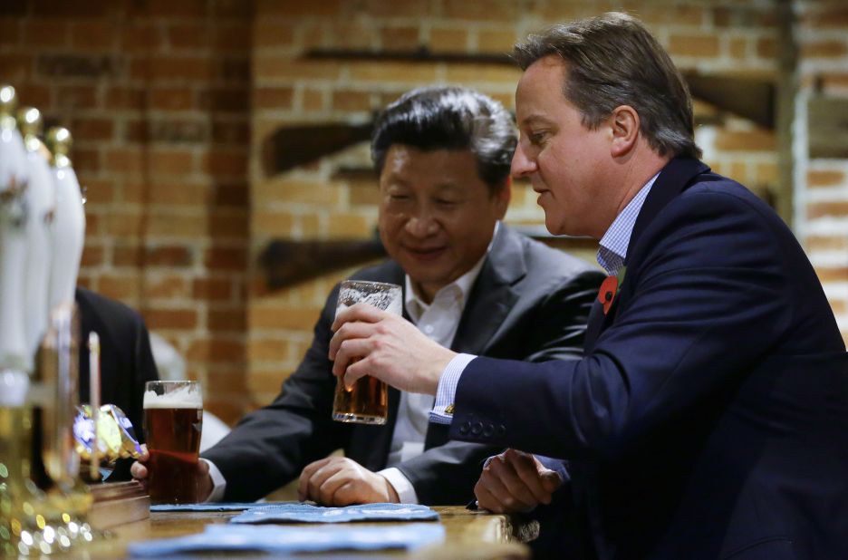 Cameron drinks a pint of beer with Xi at a pub in Princes Risborough, England, on Thursday, October 22.