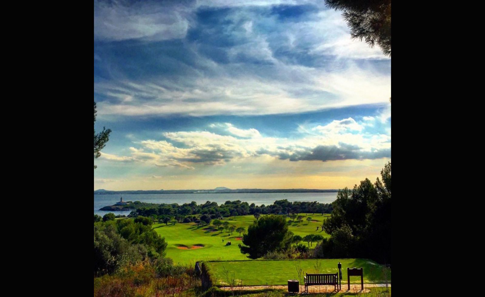 This snap sent to us by <a href="index.php?page=&url=https%3A%2F%2Finstagram.com%2Fenderlix%2F" target="_blank" target="_blank">@enderlix</a> captures the sun's rays piercing through the clouds and into the Mediterranean Sea. "The club takes its name from a nearby island just off the shore which, complete with its own lighthouse, can be seen from most of the holes," the club says.
