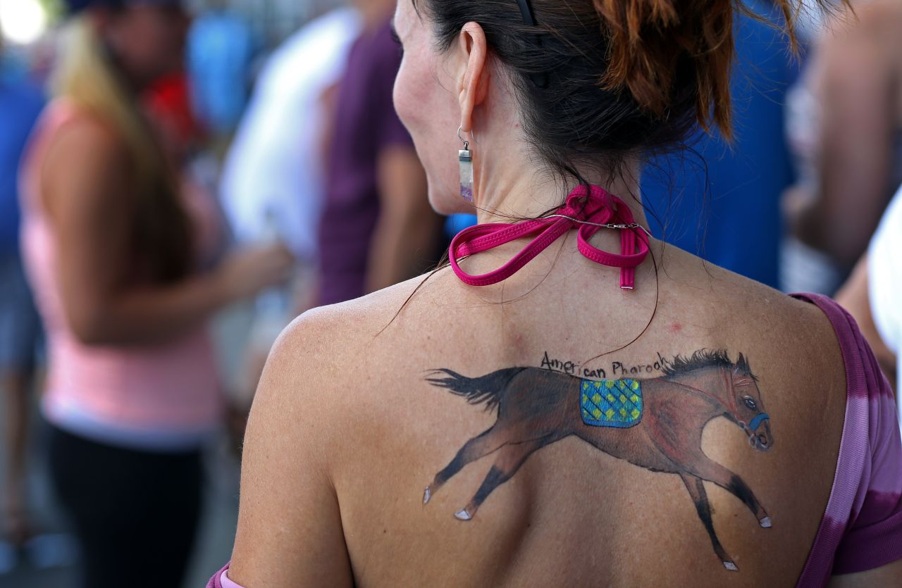 Some fans have taken their infatuation to extremes, such as this tattoo-loving racegoer.