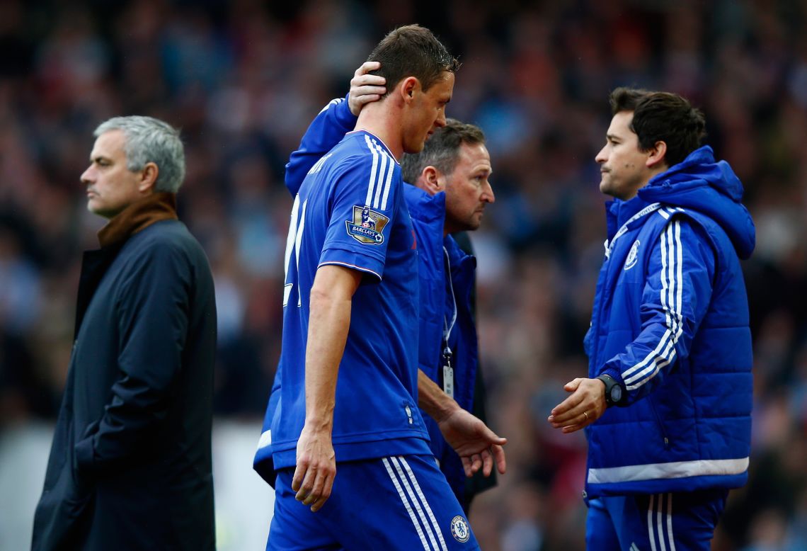 Nemanja Matic was sent off for a second yellow card and trudges past his manager Mourinho. 