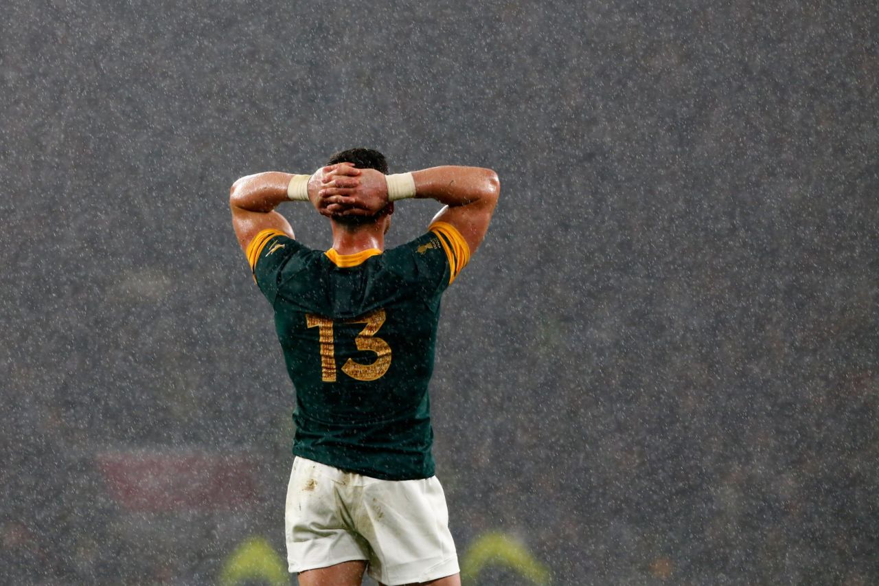 Despair in defeat. Jesse Kriel of South Africa cuts a forlorn figure as the rain pours down at Twickenham. 