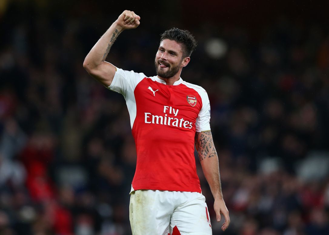 Olivier Giroud of Arsenal celebrates his team's 2-1 win over Everton to go top of the English Premier League.