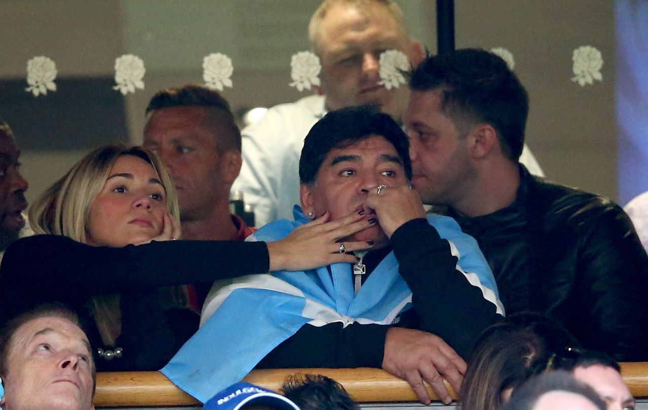 Football legend Diego Maradona looks dejected as he sees his Argentina team slipping to defeat against Australia. 