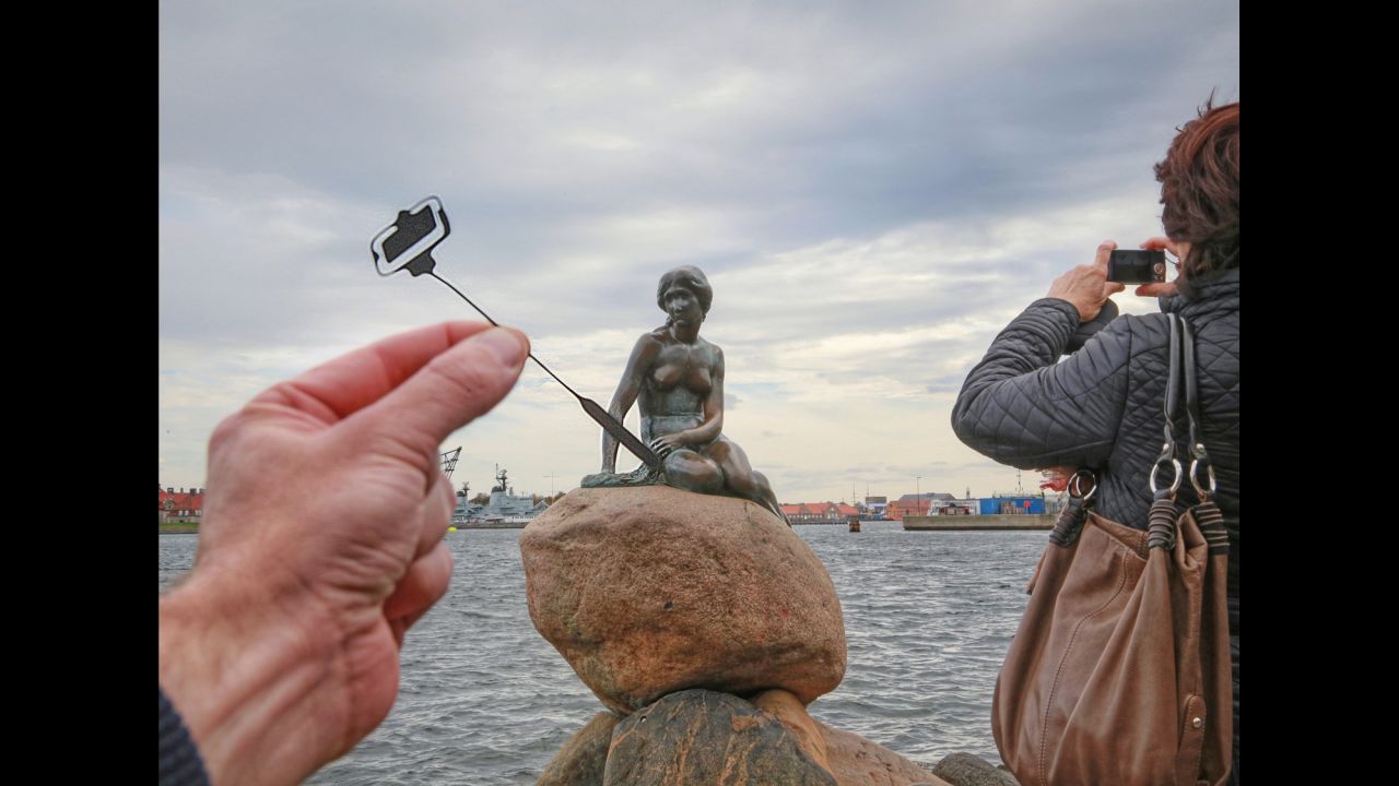 Copenhagen's Little Mermaid is apparently no selfie-stick snob.