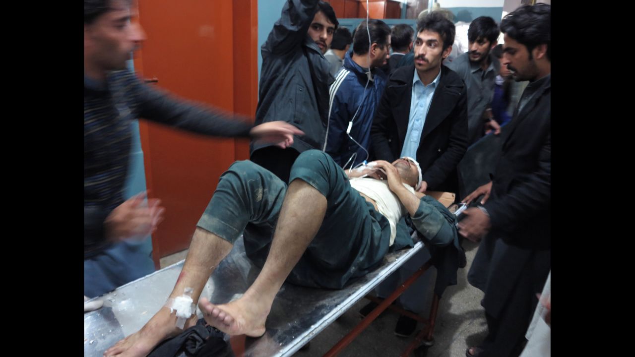 A man is brought to a hospital in Mingora, Pakistan, on October 26.