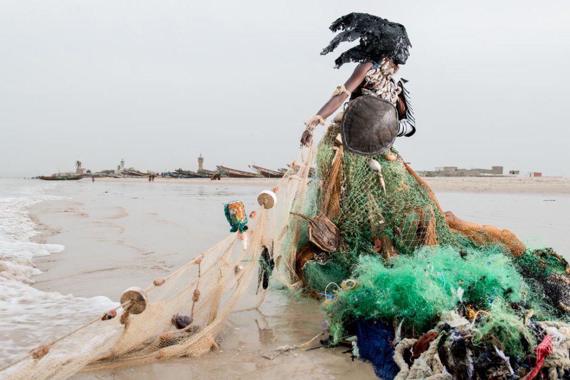 The costumes turn garbage into gowns. This dress is made of fishing nets. 