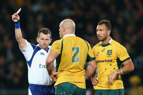 Owens has won praise for the way he referees rugby matches. The Welshman is pictured giving Australia's Quade Cooper a yellow card during a Rugby Championship match against the All Blacks in August.