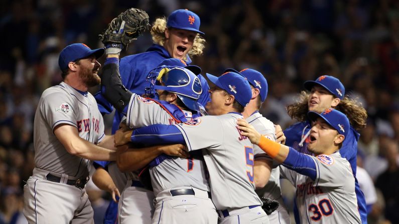 The New York Mets celebrate after defeating the Chicago Cubs in Game 4 of the 2015 MLB National League Championship Series at Wrigley Field in Chicago on Wednesday, October 21. This will be the <a href="index.php?page=&url=http%3A%2F%2Fwww.cnn.com%2F2015%2F10%2F21%2Fus%2Fcubs-mets-playoff-back-to-the-future%2F" target="_blank">Mets' fifth trip to the World Series and the first since 2000. </a>