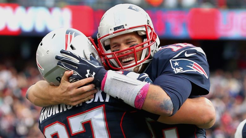 Tom Brady hugs Rob Gronkowski of the New England Patriots after Gronkowski scores a touchdown against the New York Jets at Gillette Stadium in Foxborough, Massachusetts, on Sunday, October 25. <a href="index.php?page=&url=http%3A%2F%2Fbleacherreport.com%2Farticles%2F2582683-brady-breaks-patriots-record-for-most-regular-season-starts" target="_blank" target="_blank">Brady made his 213th start in the regular season</a>, breaking the Patriots record, per the team's official website.
