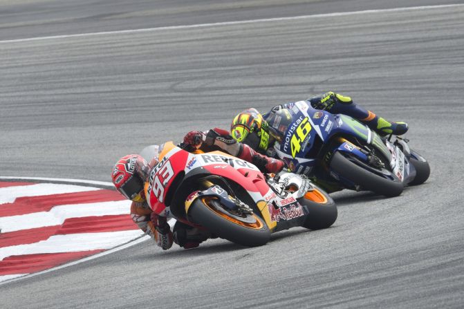 The Repsol Honda Team's Marc Marquez leads archrival Valentino Rossi of Italy and Movistar Yamaha MotoGP during the MotoGP of Malaysia. Tensions between the two would boil over at the Sepang Circuit.