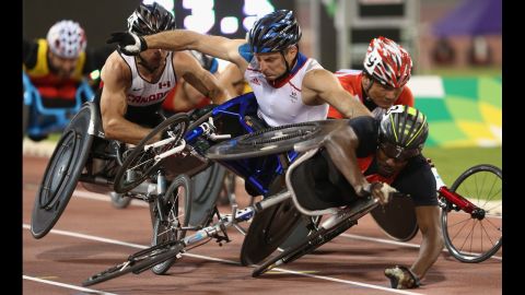 Alhassane Balde of Germany, right, collides with Julien Casoli of France during the men's 1500m T54 heats during the IPC Athletics World Championships at Suhaim Bin Hamad Stadium on Friday, October 23, in Doha, Qatar.  