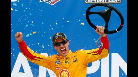 Joey Logano, winner of the NASCAR Spring Cup Series, celebrates his victory after the race in Talladega, Alabama, on Sunday, October 25.  
