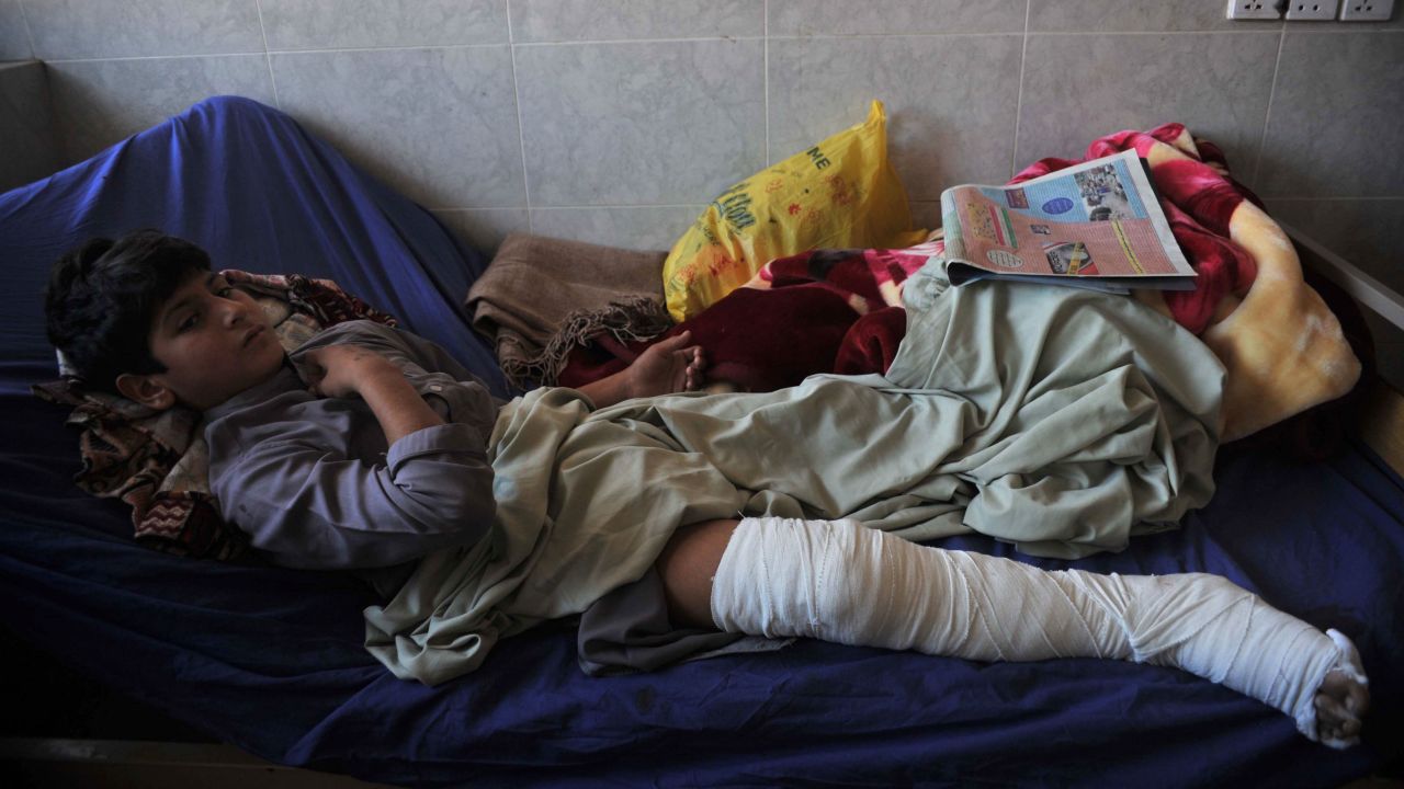 An injured boy rests at a hospital in Peshawar.