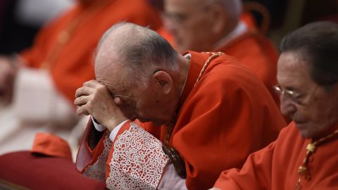 Cardinal Camillo Ruini prays during a papal mass for the 14th Ordinary General Assembly of the Synod of Bishops at St Peter's basilica on October 25, 2015 at the Vatican. AFP PHOTO / ANDREAS SOLARO (Photo credit should read ANDREAS SOLARO/AFP/Getty Images)