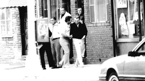 Vincent Asaro, center, with the late crime boss John Gotti, right, in a photo released by the U.S. Attorney's Office for the Eastern District of New York.