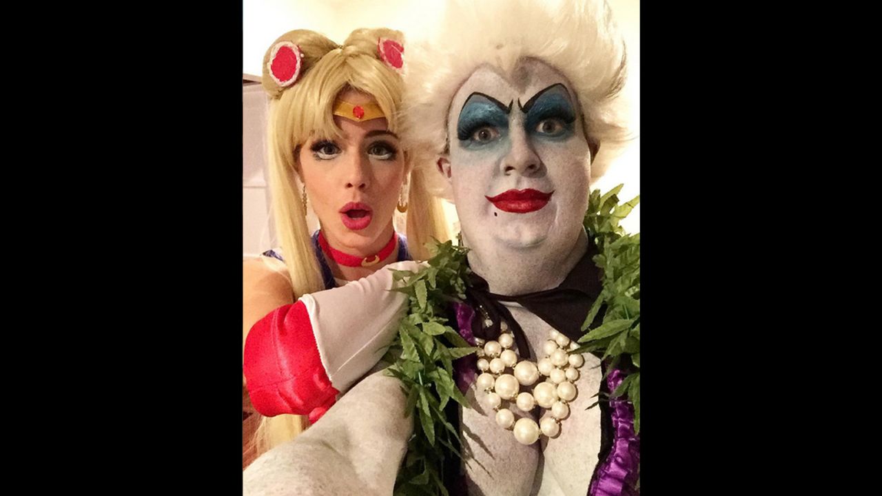 Actor Colton Haynes and actress Emily Bett Rickards reveal their Halloween costumes in a selfie shared on Instagram on Sunday, October 25. Haynes was Ursula from "The Little Mermaid" and Rickards was Sailor Moon.