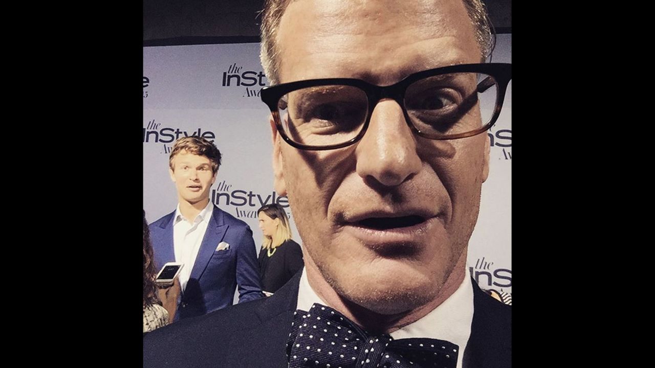 E! journalist Marc Malkin posted this selfie with actor Ansel Elgort in the background after the InStyle Awards on Monday, October 26.