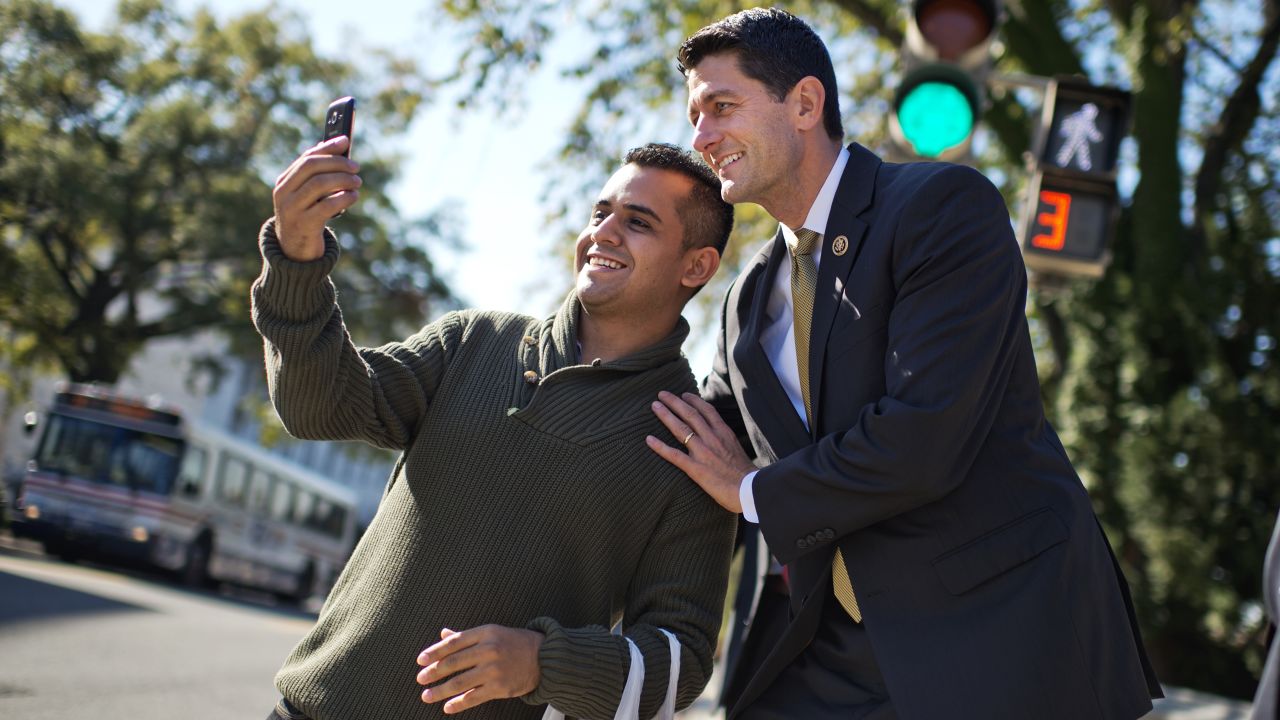 Rep. Paul Ryan, R-Wisconsin, poses for a selfie after a vote in the Capitol on Wednesday, October 21.