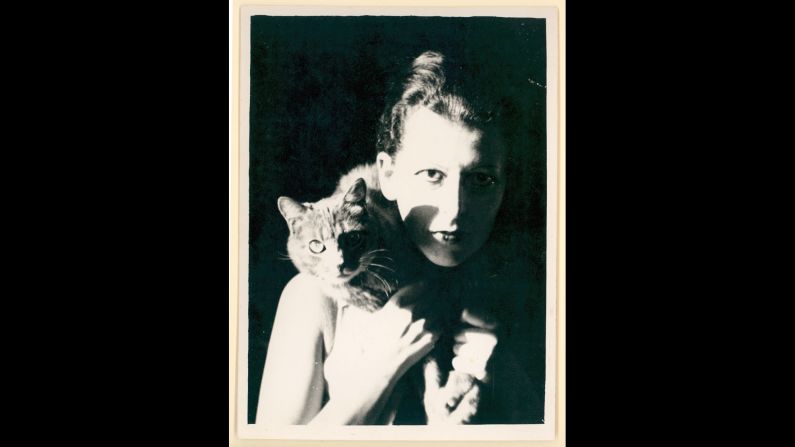 Androgynous photographer Claude Cahun played with gender roles, championed surrealism, fought against the Nazis -- and was quite fond of cats. (One <a href="index.php?page=&url=http%3A%2F%2Fwww.thedailybeast.com%2Farticles%2F2015%2F04%2F21%2Fclaude-cahun-the-lesbian-surrealist-who-defied-the-nazis.html" target="_blank" target="_blank">neighbor remembers</a> her walking a leashed cat on a beach.) She even called a late-'40s series of photographs, "The Way of Cats."