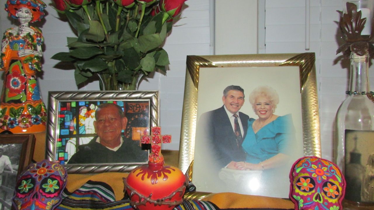 Valerie Vela honors her loved ones by placing this altar in her home each year