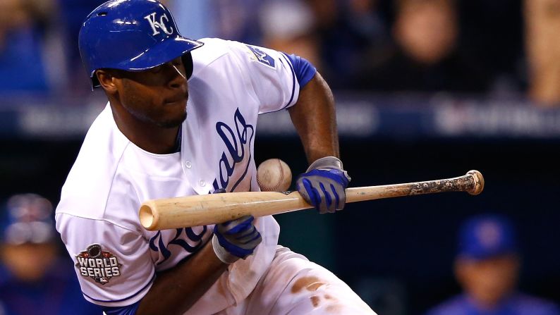 Kansas City's Lorenzo Cain attempts to bunt.