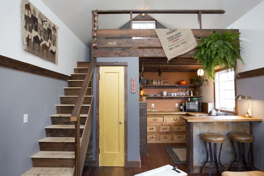 This 350-square-foot house in Portland, Oregon, is listed on <a href="https://www.airbnb.com/rooms/898771" target="_blank" target="_blank">Airbnb for $145 per night</a>. The space features a variety of reclaimed materials. The sheet metal on the bar was rescued from a TV set. 