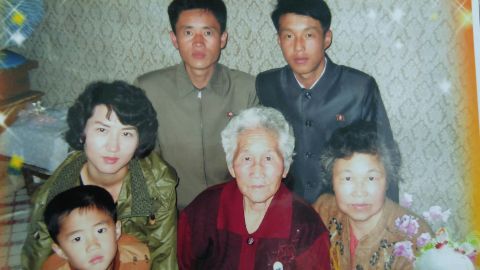 Ahn Yoon-Sook, center, and her sons and family members.