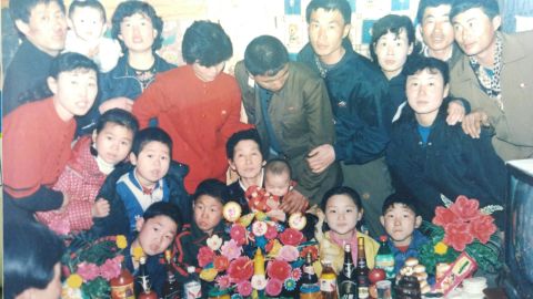 Ahn Yoon-Ae, center, with her families.